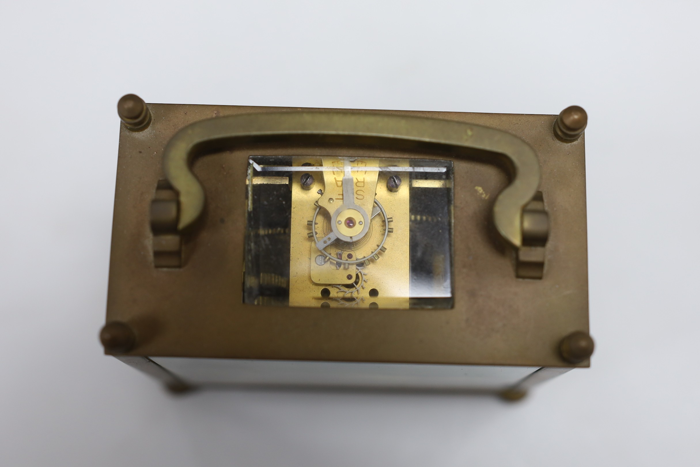A lacquered brass carriage clock, 12cm wide, cased